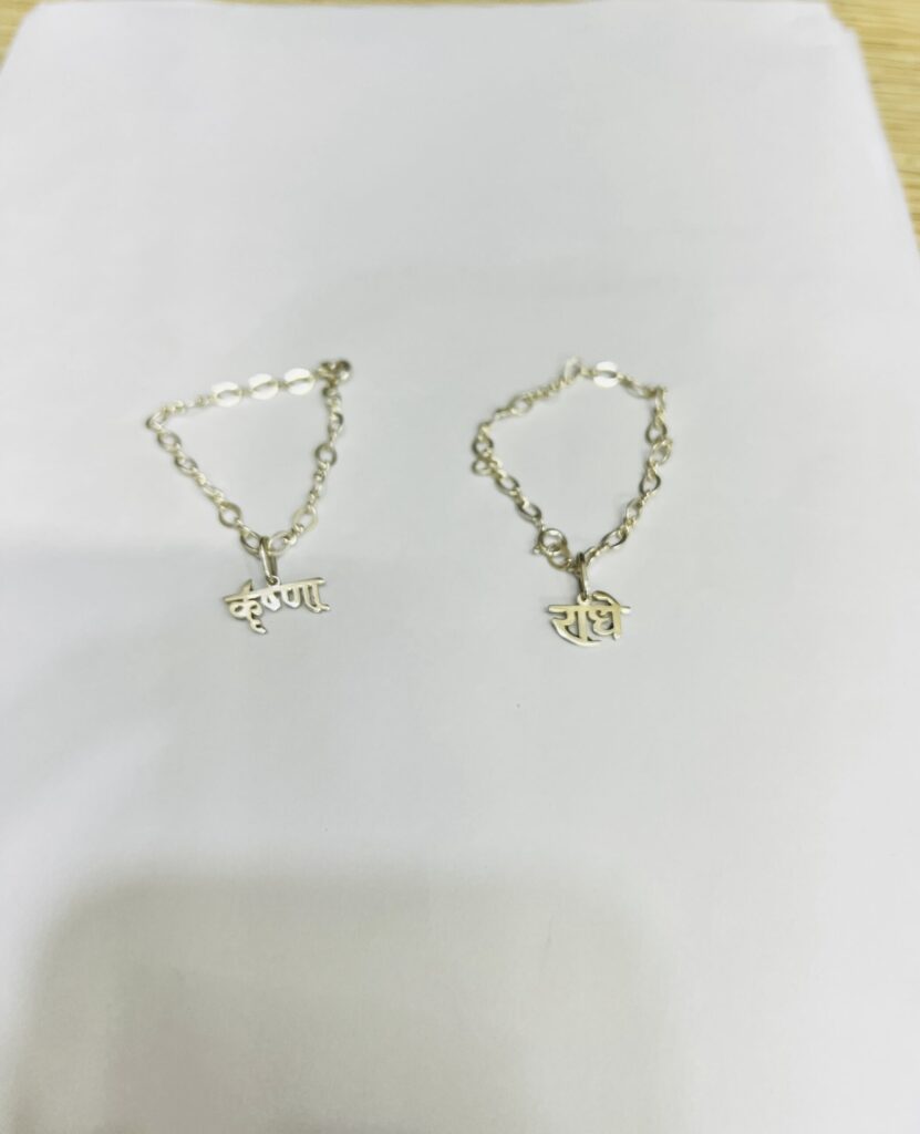 925 silver Radhe.  Krishan locket and chain.